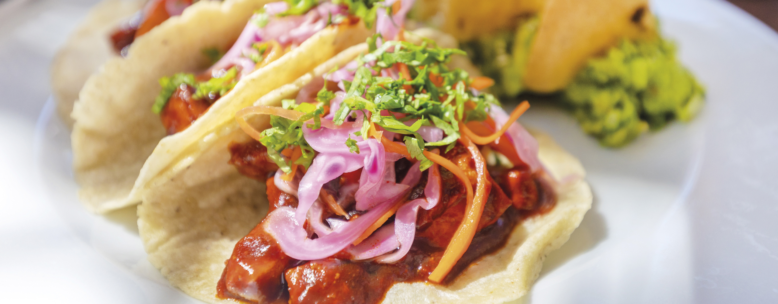 Tacos di pollo in umido con guacamole