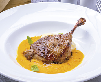 Coscia di anatra confit con puré di zucca